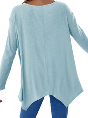 Pastel blue ribbed knit tunic with asymmetric hem and long sleeves