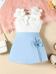 Baby girl sky blue skort set with white floral applique tank top and pearl bow detail.