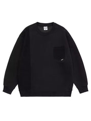 Black crewneck sweatshirt with contrasting textured panel and chest pocket