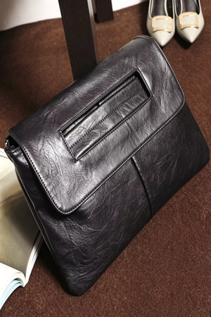 Black distressed leather envelope clutch with cut-out handle detail