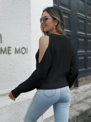 Black cold shoulder knit sweater with long sleeves and a relaxed fit.