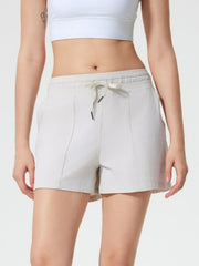 Coastal Drawstring Utility Shorts in light gray with drawstring waist and side pockets.