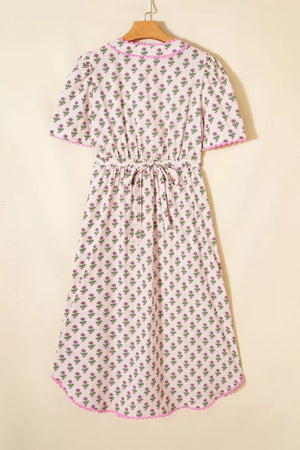 Blush pink floral midi dress with scalloped trim and tie waist
