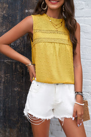 Textured yoke dot tank top in black with casual chic style for women.