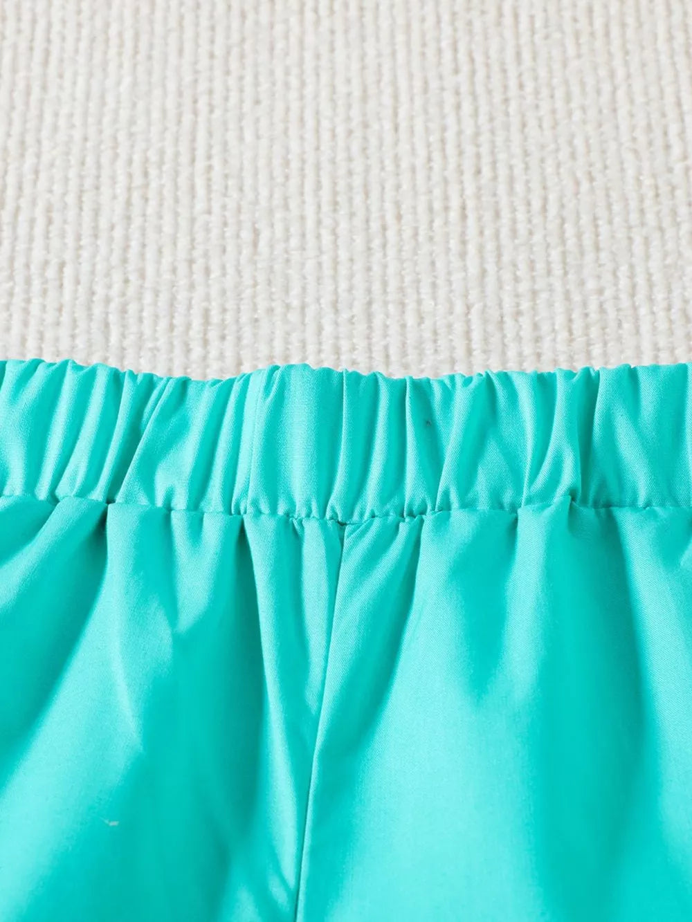 Baby shorts in tangerine with elastic waistband