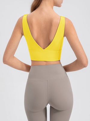 Yellow backless performance crop top with V-neck and wide band