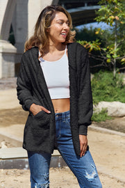 Plush hooded cardigan jacket in black with pockets and ribbed cuffs.
