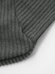 Dark gray ribbed knit asymmetrical top detail
