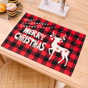 Festive plaid placemat with Merry Christmas text and reindeer design