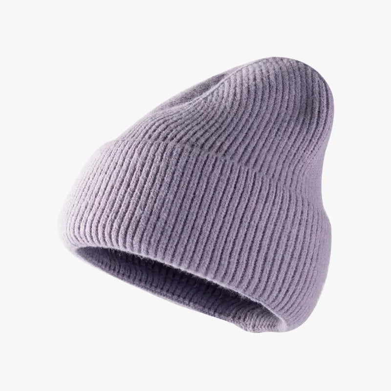 Ribbed knit slouch beanie in Lavender with a relaxed fit.