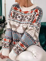 Fair Isle reindeer motif knit sweater with snowflake and diamond patterns.