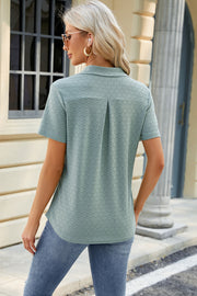 Light Green textured polo shirt with V-neck detail and short sleeves.