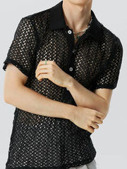 Black openwork mesh polo shirt with short sleeves and a button-up collar.