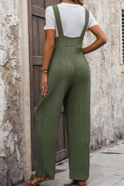 Textured linen jumpsuit in matcha green with wide legs and adjustable straps.
