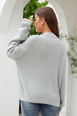 Light Gray textured knit cardigan with a collared neckline and oversized pockets.