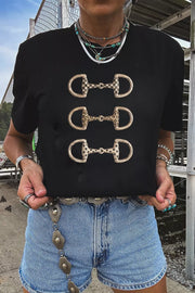 Black cotton t-shirt with three equestrian bit graphics in checkerboard, leopard, and polka dot prints.