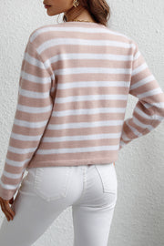 Nautical stripe knit cardigan in blush pink and white acrylic with gold buttons.
