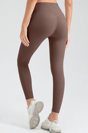 Mocha high rise seamless leggings with V-seam detail, shown from the back.
