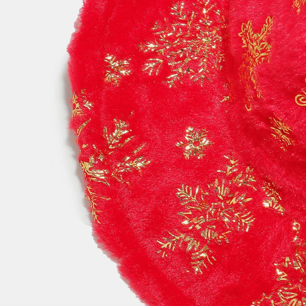 Crimson faux fur cowboy hat with gold snowflake pattern.