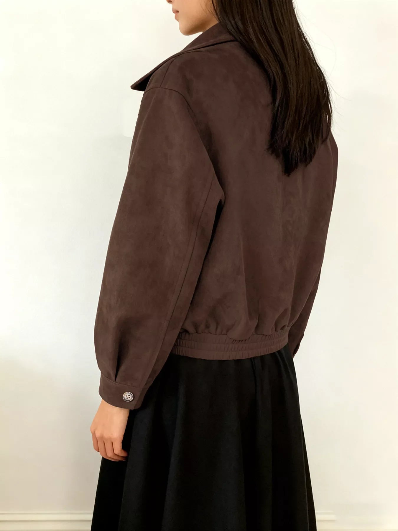 Brown zip up long-sleeve jacket with elastic hem and button cuff detail