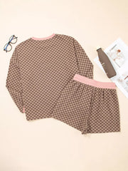 Camel checkerboard loungewear set with pink trim, includes long sleeve top and shorts.