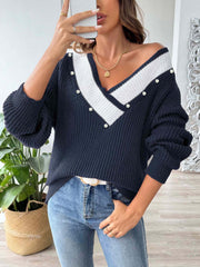 Dark Blue ribbed knit sweater with pearl trim V-neck and white stripe detail.