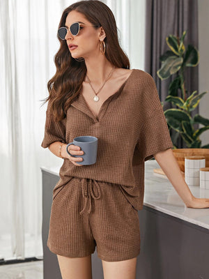 Brown waffle knit henley short set with v-neck and drawstring shorts.