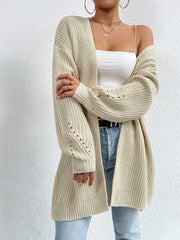 Longline knit open cardigan in cream with textured sleeves and open knit details.