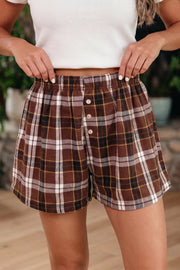 Brown plaid cotton shorts with elastic waist and button detail