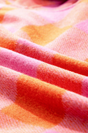 Sunset Check Overshirt in orange and pink plaid fabric detail