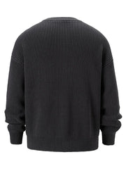 Dark gray ribbed knit oversized sweater with crew neck and long sleeves.