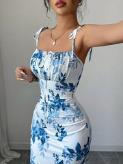 Floral print tie strap maxi dress in Peacock Blue with ruched sides and sweetheart neckline.