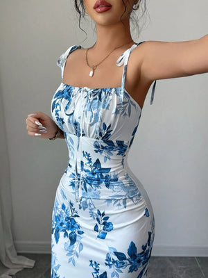 Floral print tie strap maxi dress in Peacock Blue with ruched sides and sweetheart neckline.
