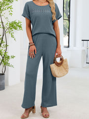 French blue lace cutout waffle knit two-piece set with wide leg pants and short sleeves.