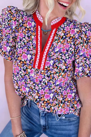 Floral drape v-neck shirt with puff sleeves and red plaid trim