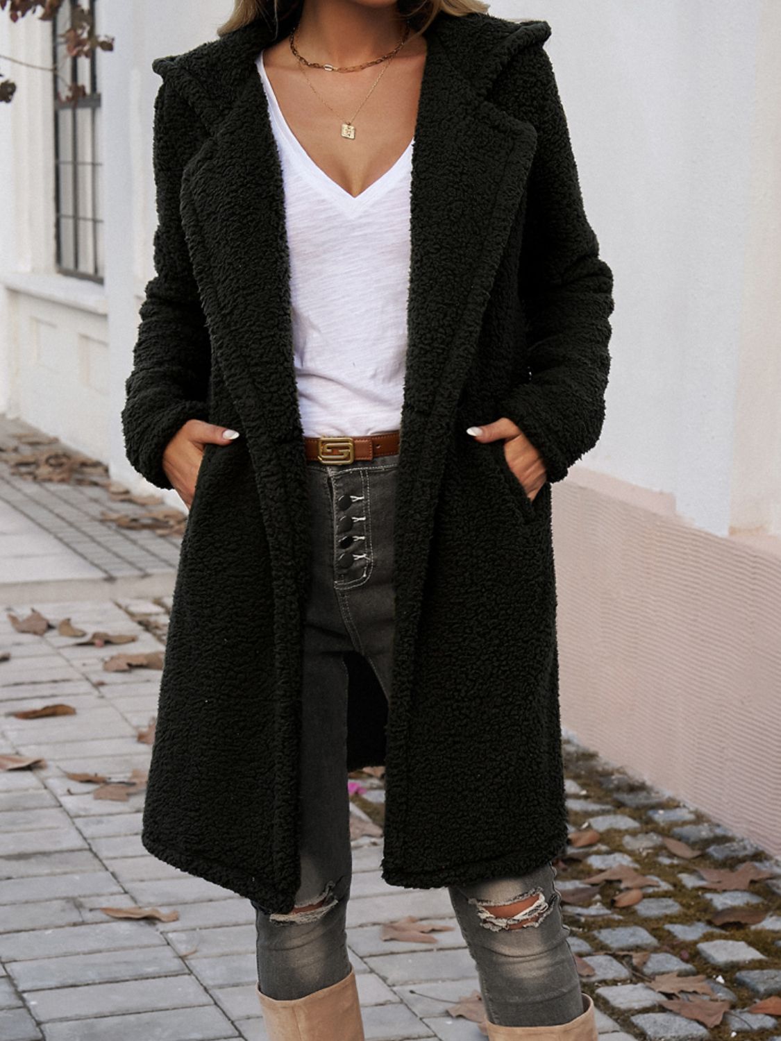 Black teddy hooded cocoon coat with a relaxed fit and open front.