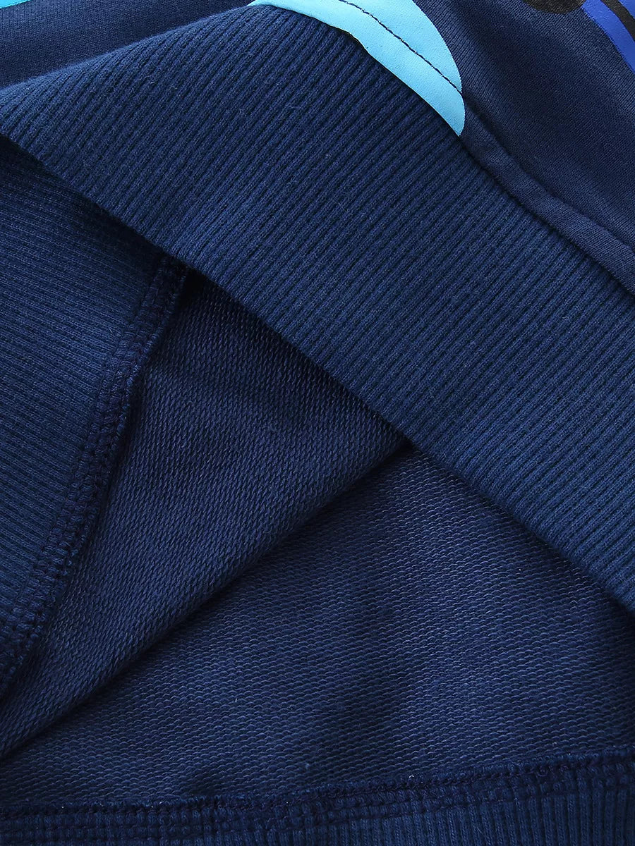 Navy cotton blend toddler sweatshirt with racing car print detail and ribbed cuffs.