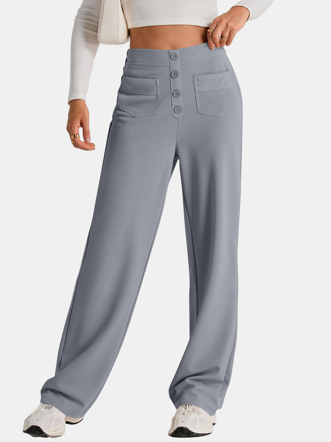 Gray button-front palazzo trousers with flap pockets and a wide leg.