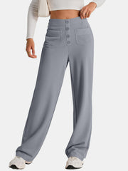 Gray button-front palazzo trousers with flap pockets and a wide leg.