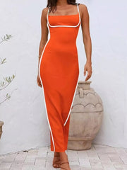 Orange spaghetti strap maxi dress with white contrast piping and a bodycon fit.