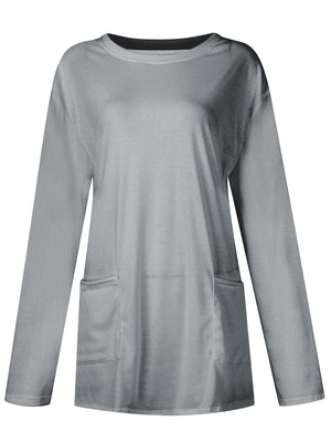 Gray relaxed fit tunic with long sleeves and two patch pockets.