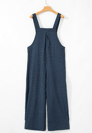 Dark blue gingham textured wide-leg overalls with button detail