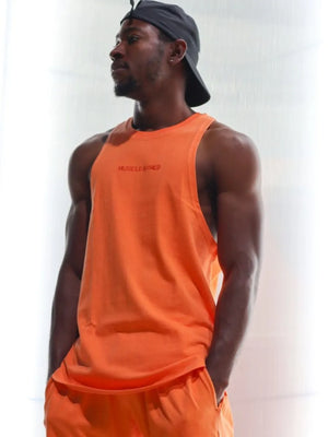 Orange washed cotton blend muscle tank top with subtle chest logo