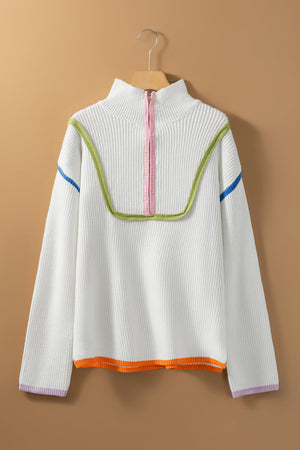 White ribbed quarter-zip pullover sweater with colorblock trim and neckline detail.