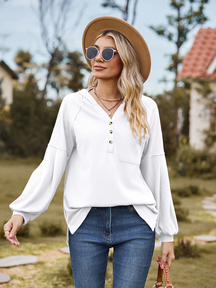 White ribbed henley hoodie with balloon sleeves and button detail