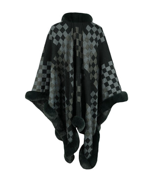 Charcoal checkered poncho with faux fur trim and pom-poms.