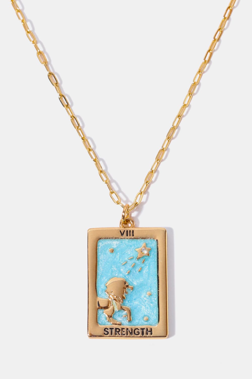 Gold chain necklace with a rectangular light blue tarot card pendant featuring Strength and Roman numeral VIII.