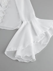 White ruffled flounce sleeve blouse with layered flounce detail.