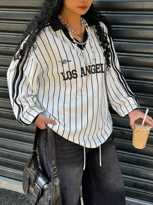 Los Angeles striped long-sleeve t-shirt with black collar and cuffs, featuring "LOS ANGELES" text.