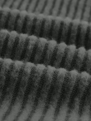 Dark gray ribbed knit top with a soft, fuzzy texture.